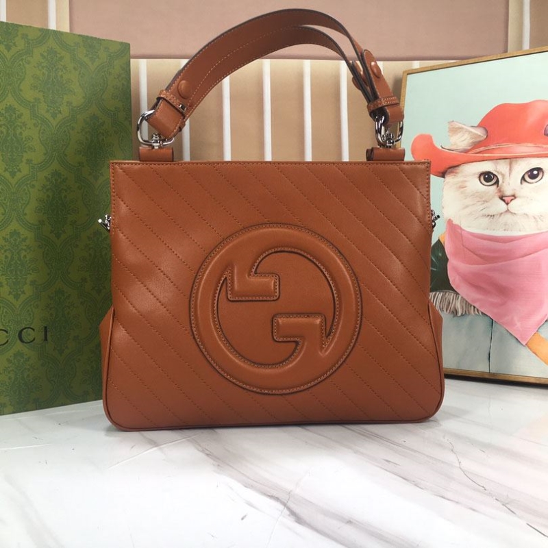 G*u*i shopping bags